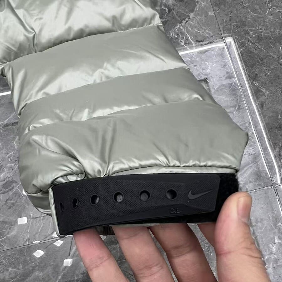 Chaqueta Puffer Nike NOCTA Gris