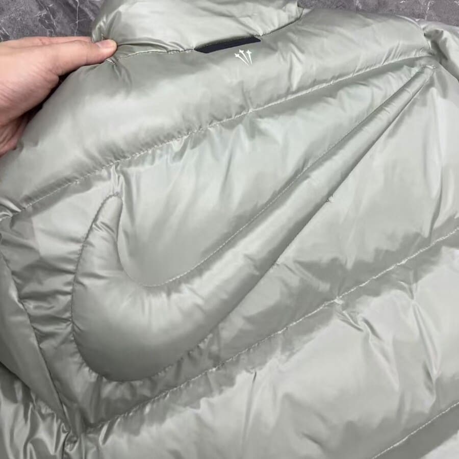 Chaqueta Puffer Nike NOCTA Gris