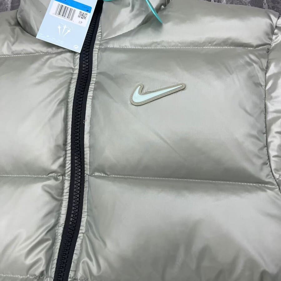 Chaqueta Puffer Nike NOCTA Gris